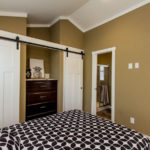 Image shows upgrade to include painted accent wall and upgrade to ductless heat/air system.