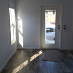 Image shows standard linoleum installed. Fire extinguisher and toggle light switches are standard in all park models.